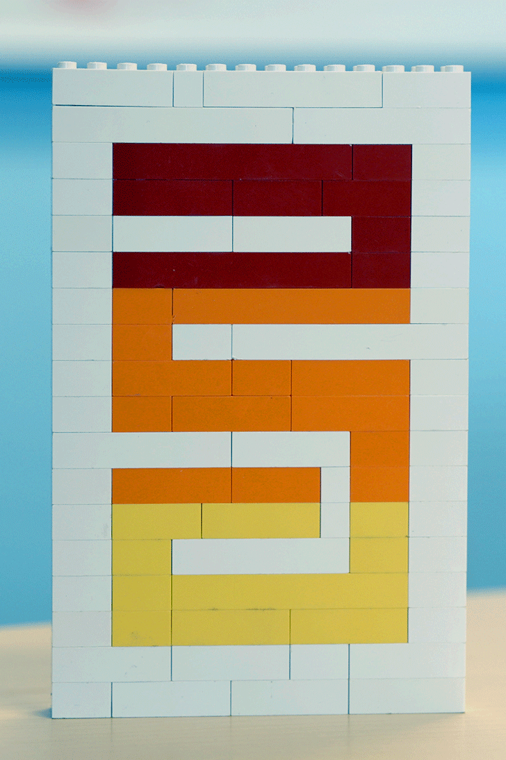 Image of multiple hands joining together in unity.