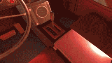 Gif of IEYTD showing a player opening a car middle console and retrieving items