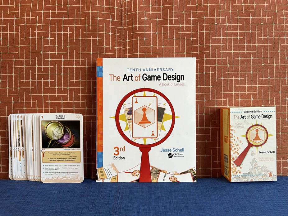 The Art of Game Design book and Deck of Lenses by Jesse Schell