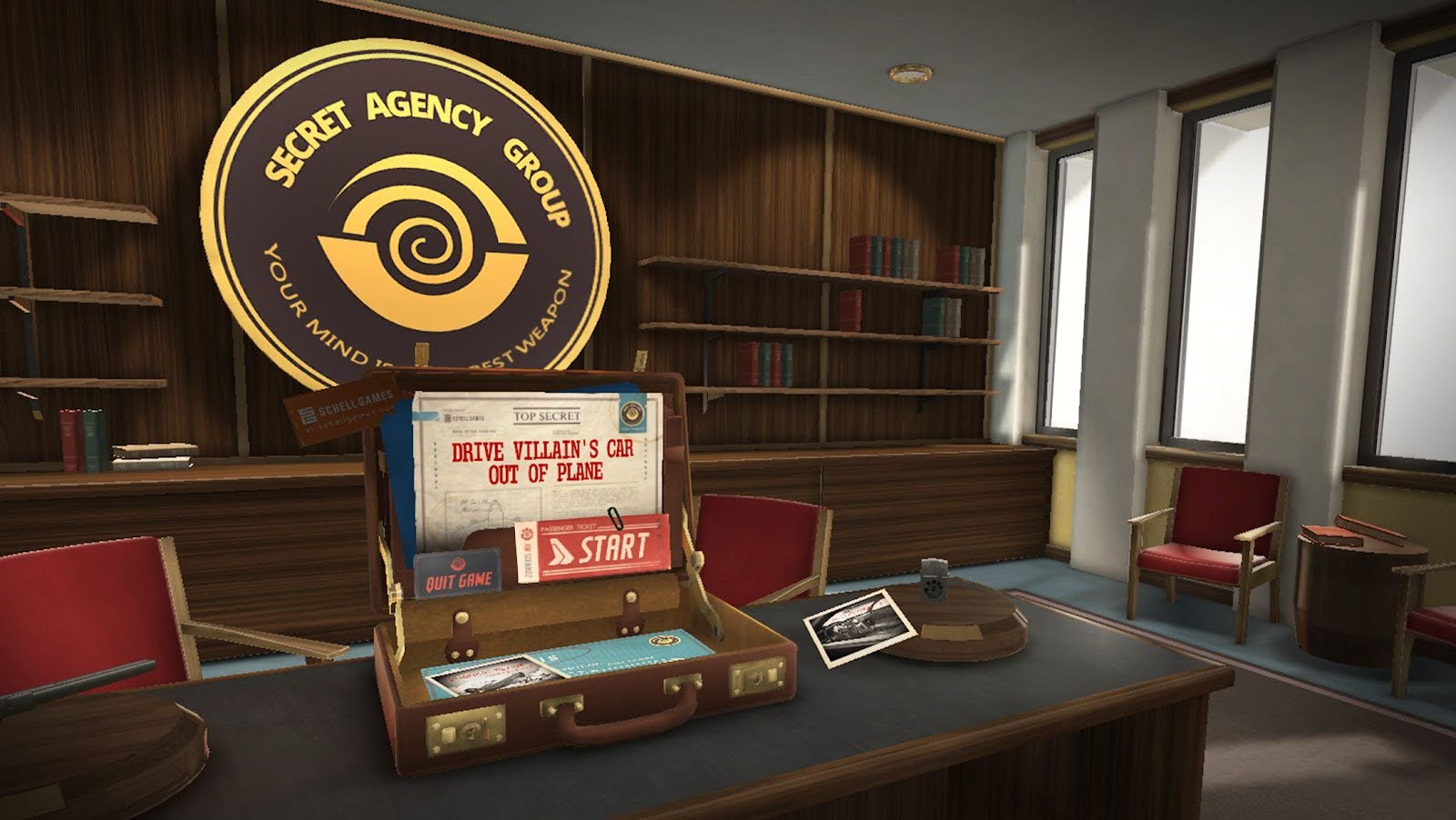 IEYTD concept art showing a briefcase detailing your secret mission in an office environment